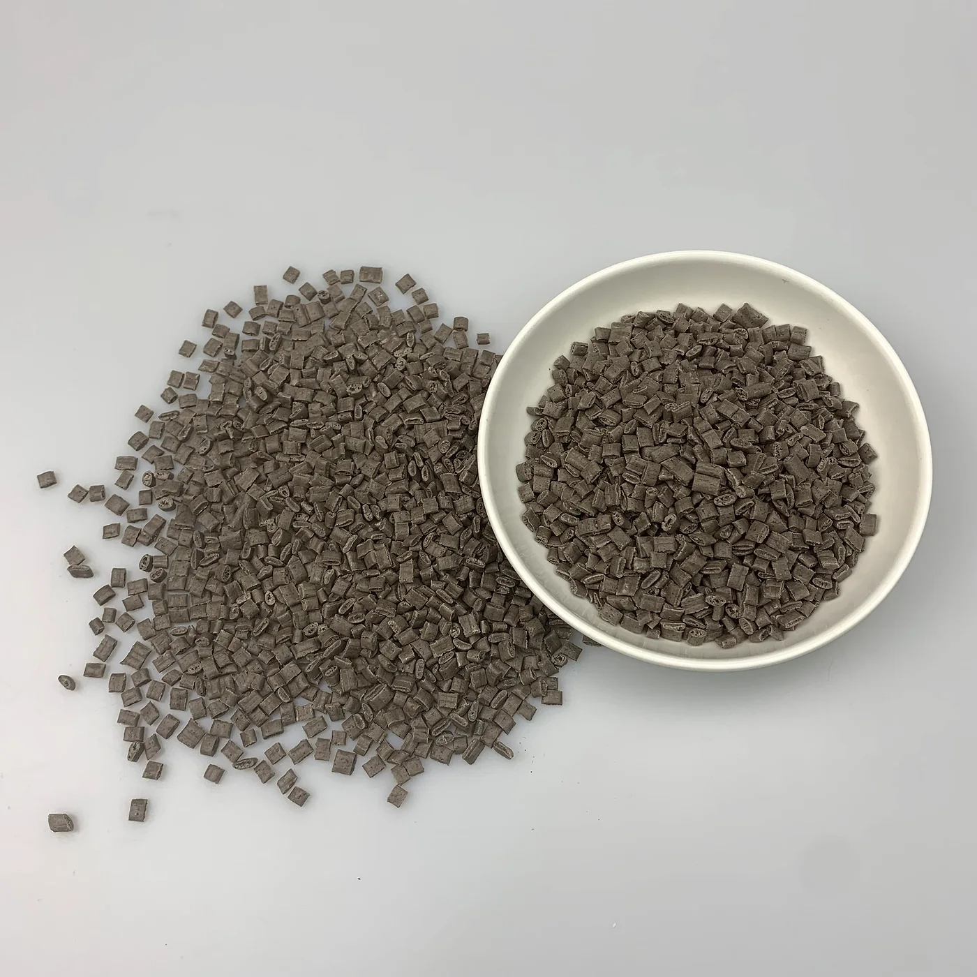 Coffee grounds composite ABS brown pellet close-up